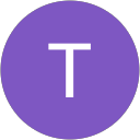 T K